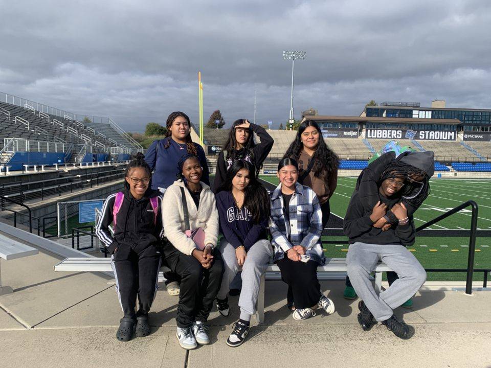 GVSU Charter School students posing in Lubbers Stadium